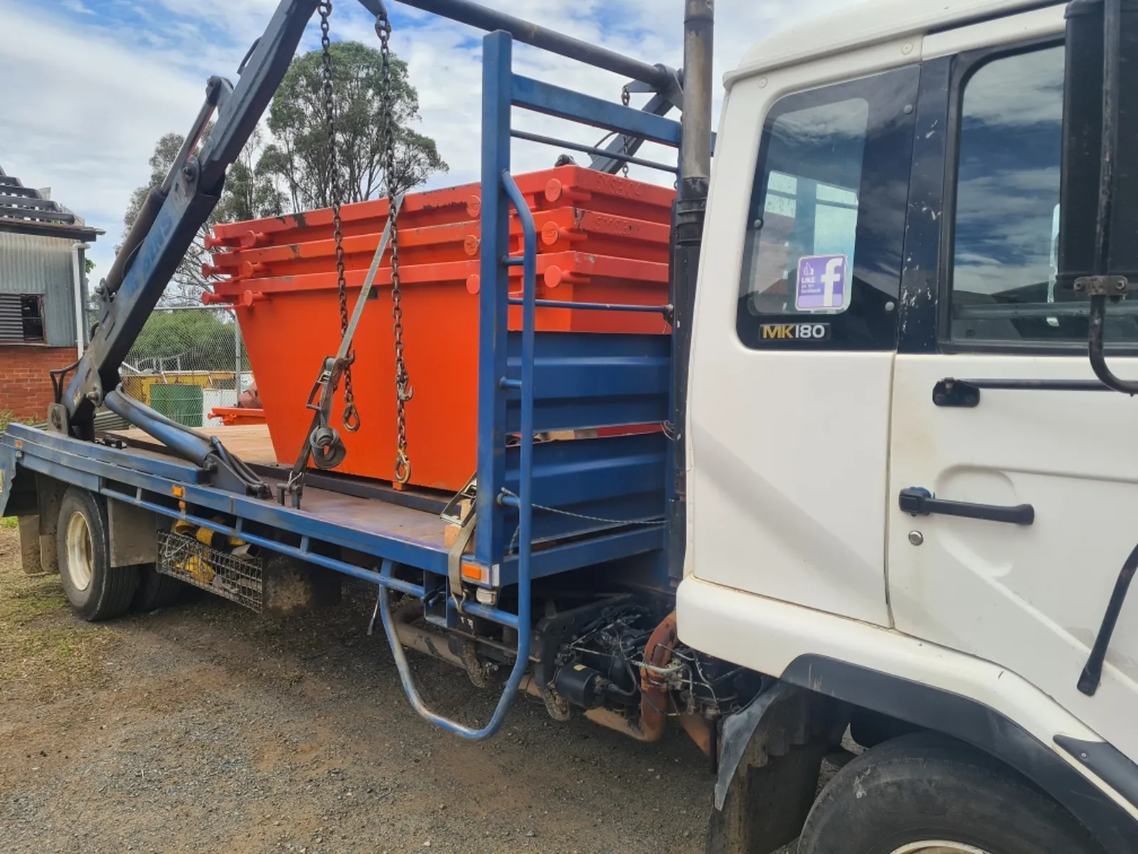 Skip bins loaded on the skip-lift truck